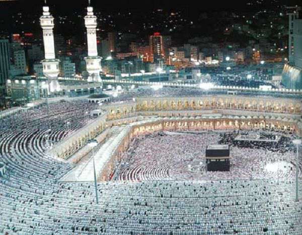 Haj. Muslims praying in Mecca during Haj season