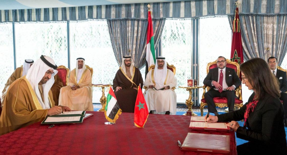 CASABLANCA, MOROCCO - March 17, 2015: HH Sheikh Mohamed bin Zayed Al Nahyan Crown Prince of Abu Dhabi and Deputy Supreme Commander of the UAE Armed Forces (back center L), and HM King Mohammed VI of Morocco (back center R), witness the signing of a memorandum of understanding between Mubadala Petroleum and Morocco in regards to exploration of the sea north of Morocco. Seen signing on behalf of the UAE is HE Dr Sultan Ahmed Al Jaber UAE Minister of State, Chairman of Masdar, and Chairman of the Abu Dhabi Ports Company (ADPC) , and Mubadala CEO, Energy (L), and signing on behalf of Morocco is HE Amina Benkhadra General Director of The National Office of Hydrocarbons and Mines (ONHYM) of Morocco (R). ( Donald Weber / Crown Prince Court - Abu Dhabi )