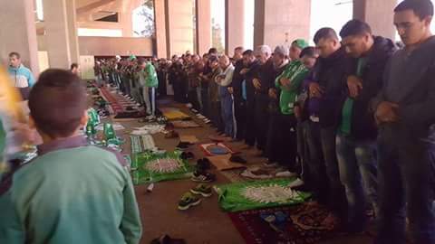 Raja Casablanca fans performing a prayer during half time. Image from archive.
