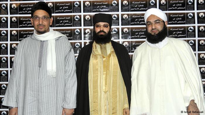 Hassan El-Kettani (right side), Abdelwahab Rafiki (also known as Abu Hafs; on the left side), and Umar Al-Hadouchi (in the middle).