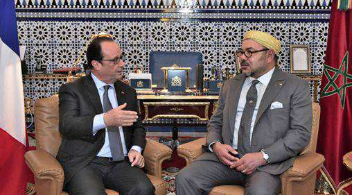 King Mohammed VI hold talks with French President yesterday in Marrakech.