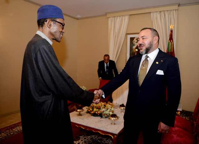 King Mohammed VI greeting Nigerian president Muhammadu Buhari. 
