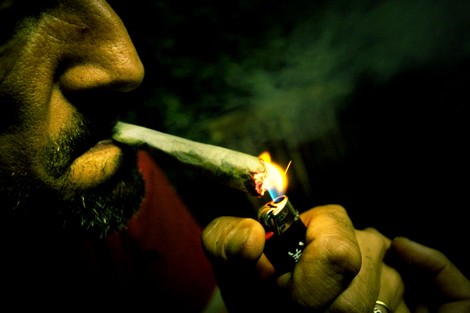 Moroccan man smoking weed. Image for illustration purposes only.