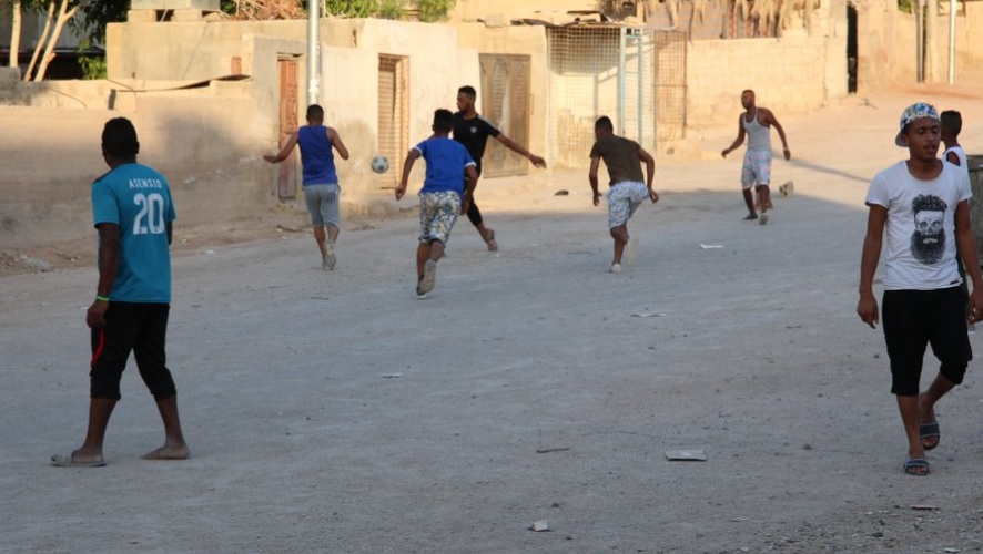 young teenagers playing soccer. Image for illustration purposes only.